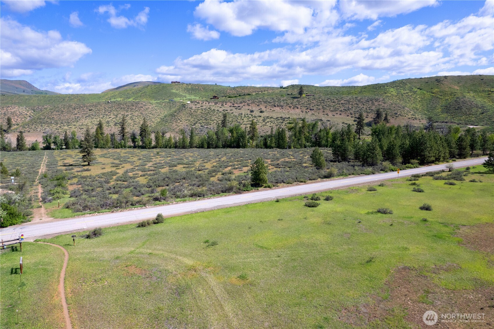 0 Wolf Creek Road Winthrop, WA 98862 - Photo 8 of 40 a view of a lake with sunset