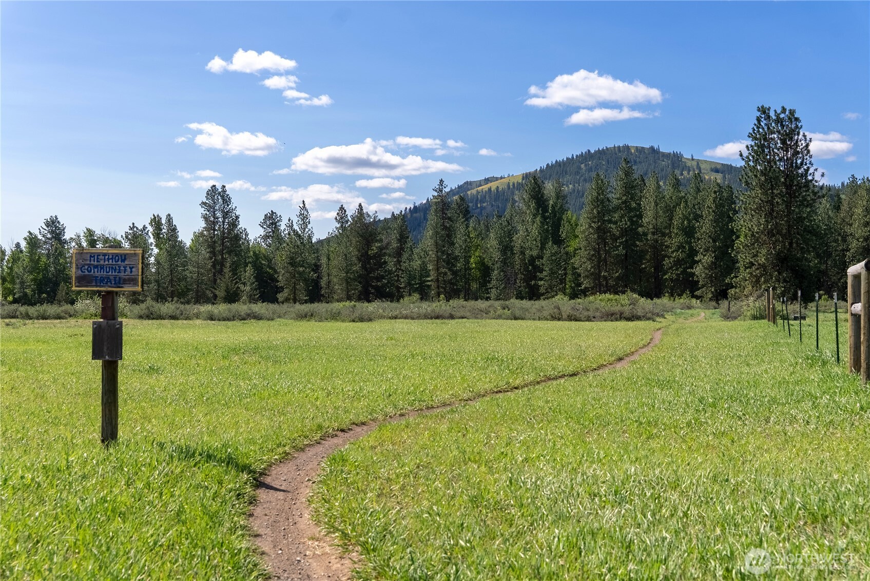 0 Wolf Creek Road Winthrop, WA 98862 - Photo 9 of 40 a view of a golf course with a lake