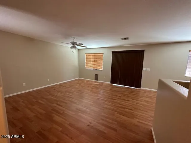 a view of kitchen with stainless steel appliances granite countertop a stove top oven a sink a counter space and cabinets