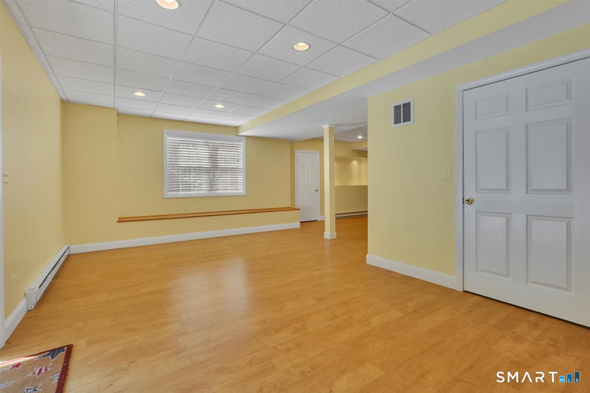 25 Fenwick Drive Avon, CT 06001 - Photo 33 of 40 a view of an empty room with a window