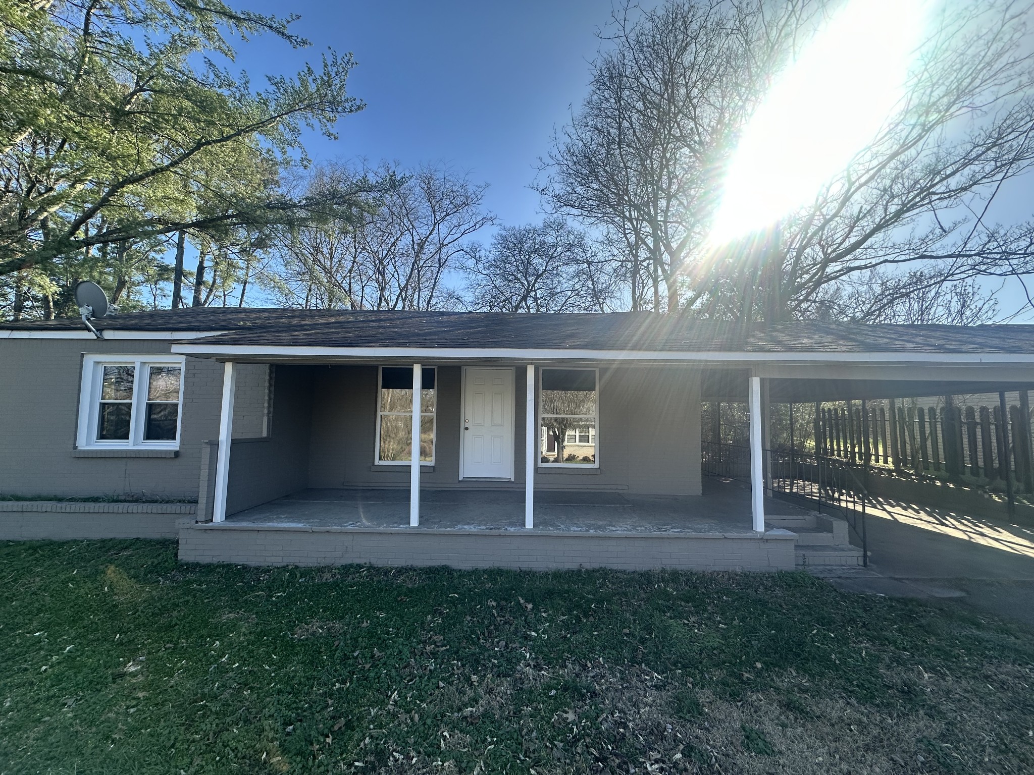 204 Ruby Street Winchester, TN 37398 - Photo 1 of 14 a front view of a house with garden