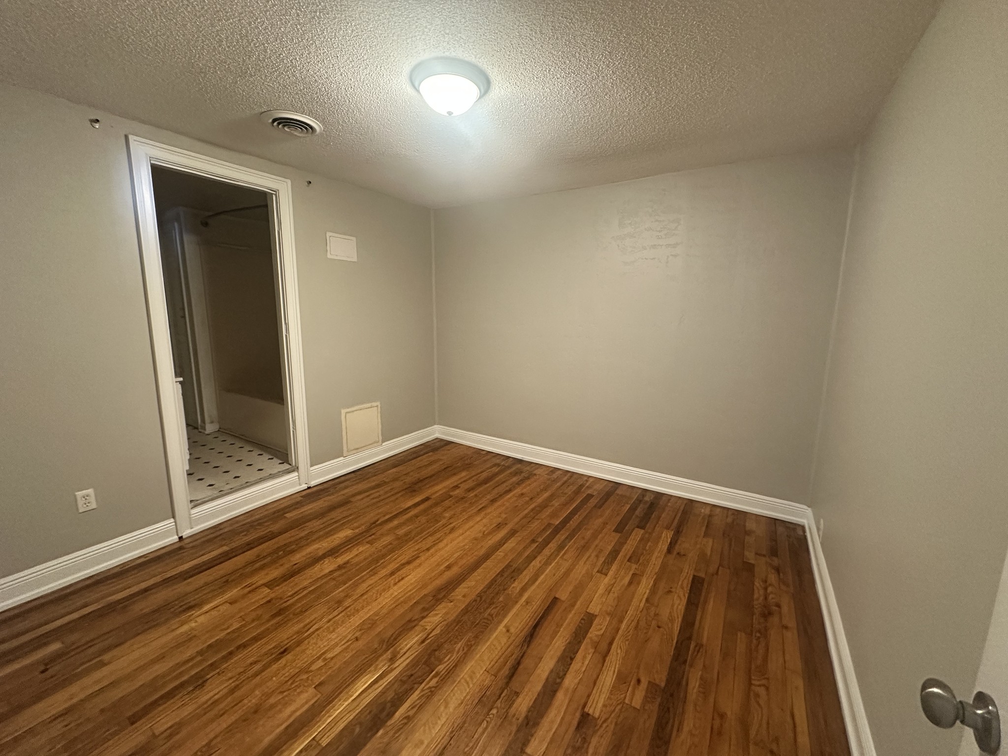 204 Ruby Street Winchester, TN 37398 - Photo 11 of 14 a view of wooden floor in a room