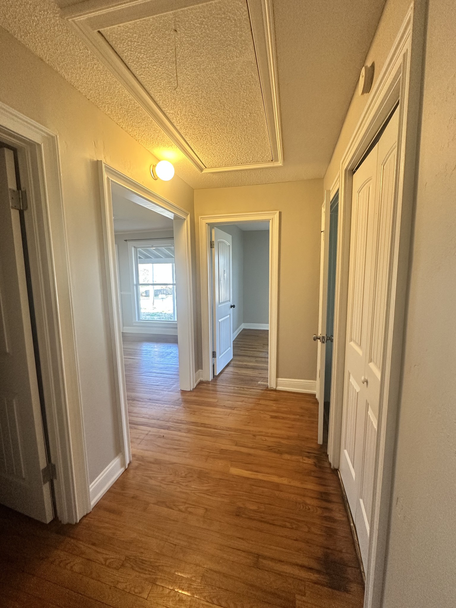 204 Ruby Street Winchester, TN 37398 - Photo 8 of 14 a view of a livingroom with wooden floor and stairs