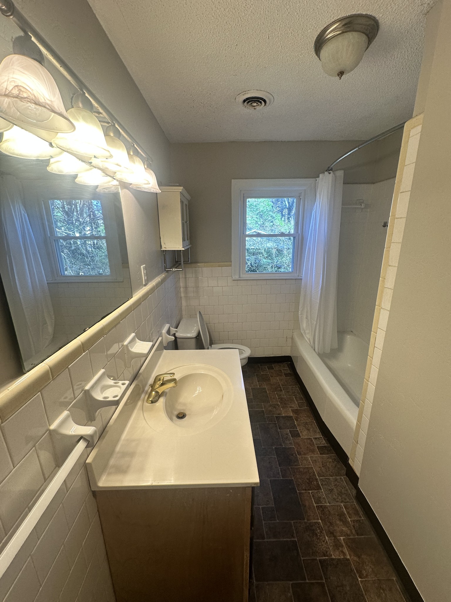 204 Ruby Street Winchester, TN 37398 - Photo 9 of 14 a bathroom with a sink and a mirror