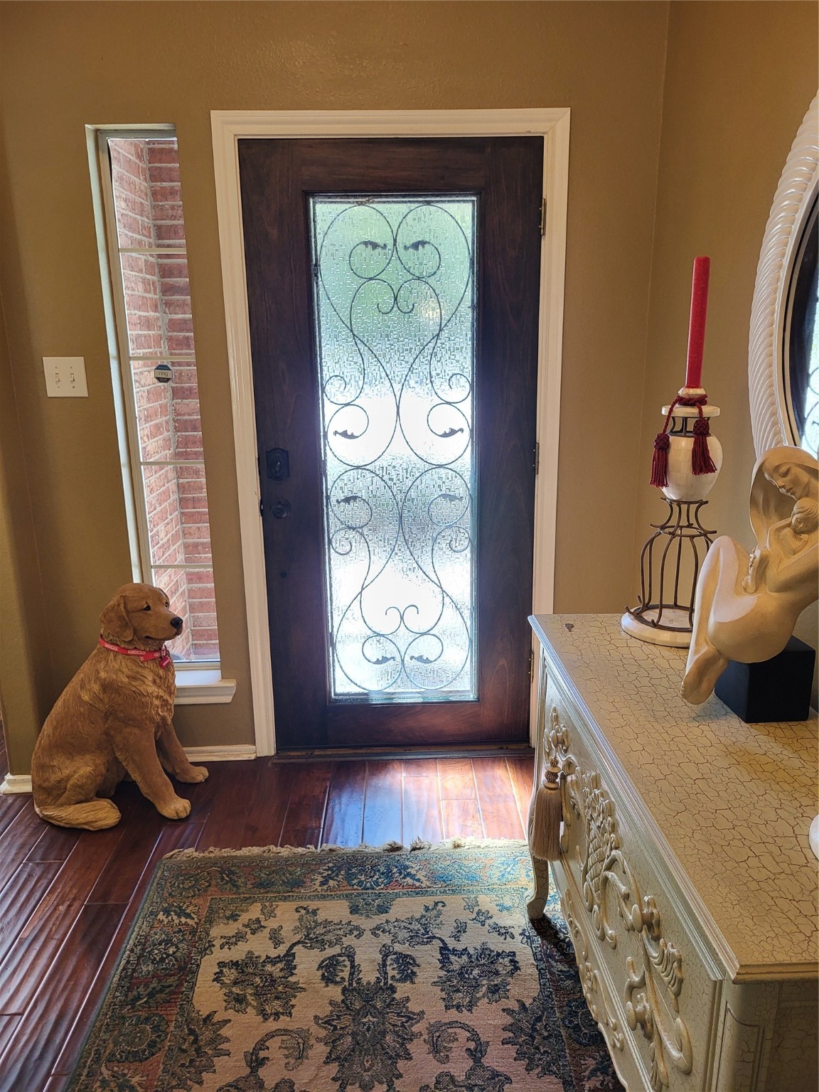 20226 Entrada Court Humble, TX 77346 - Photo 12 of 29 Front door features a wrought iron obscured glass. Note there is a ring doorbell/camera.