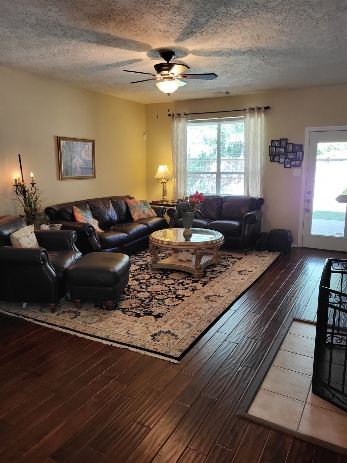 20226 Entrada Court Humble, TX 77346 - Photo 14 of 29 Here we see again the lovely wood floors to the rear exit door to the patio.