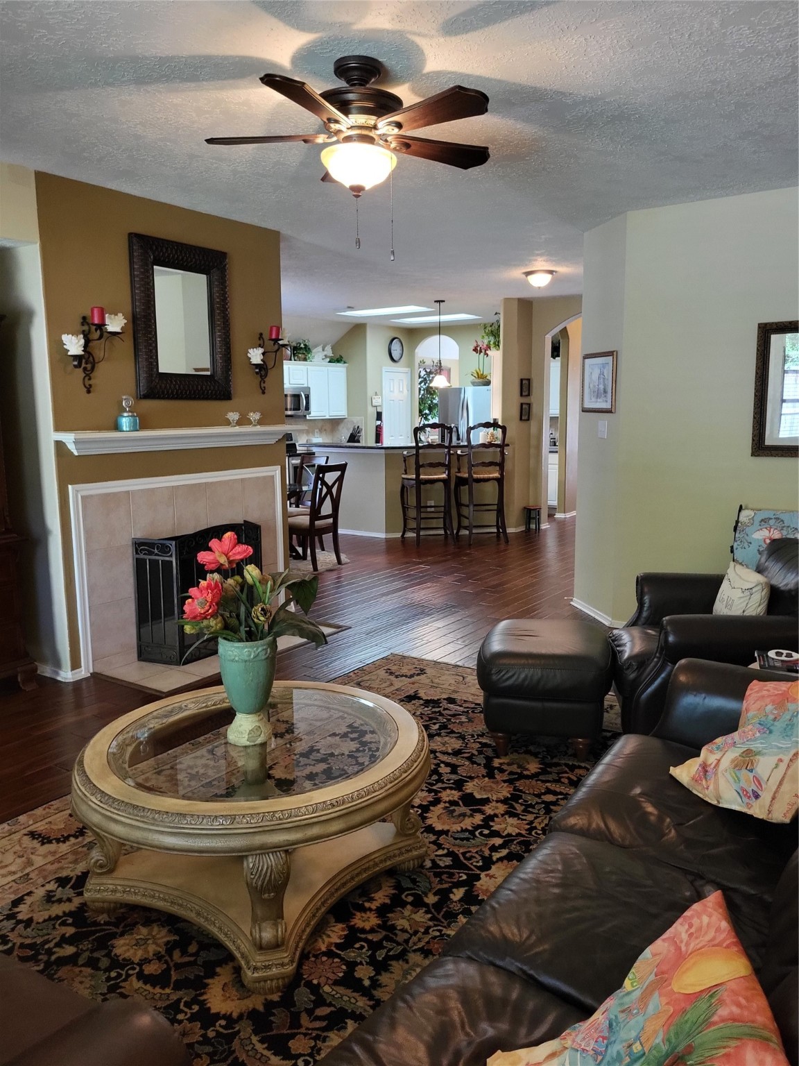 20226 Entrada Court Humble, TX 77346 - Photo 15 of 29 a living room with furniture and a fireplace