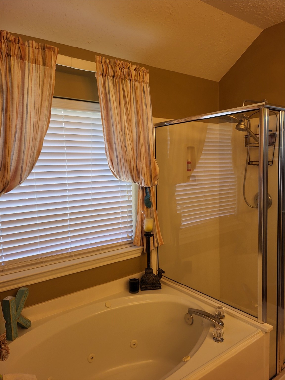 20226 Entrada Court Humble, TX 77346 - Photo 20 of 29 a bathroom with a tub and a shower