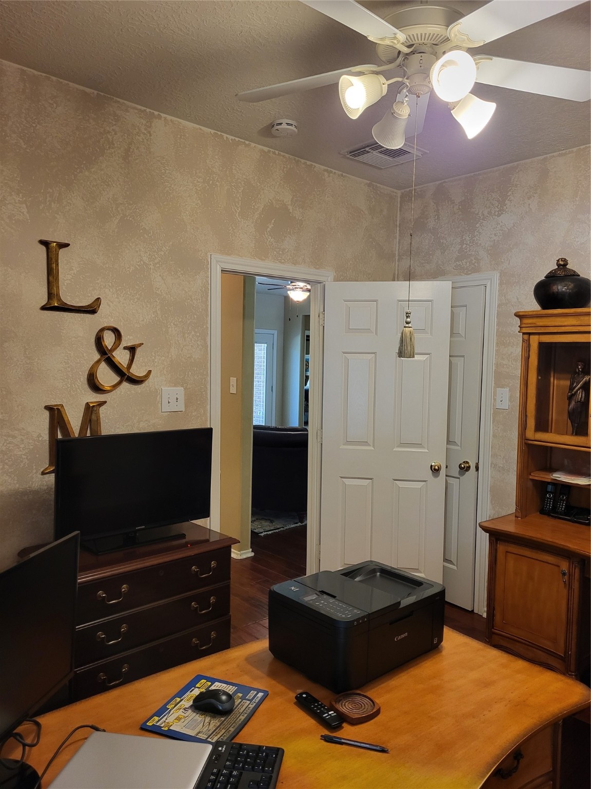 20226 Entrada Court Humble, TX 77346 - Photo 21 of 29 The secondary bedrooms are split by the second bath and is currently being used as an office. This room also has a walk in closet.