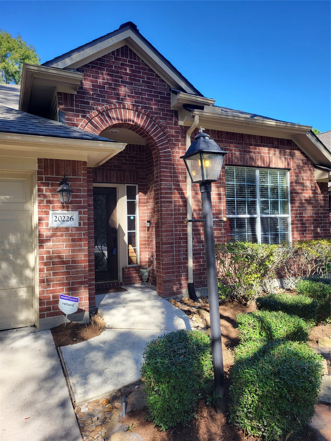 20226 Entrada Court Humble, TX 77346 - Photo 29 of 29 a front view of a house with a yard