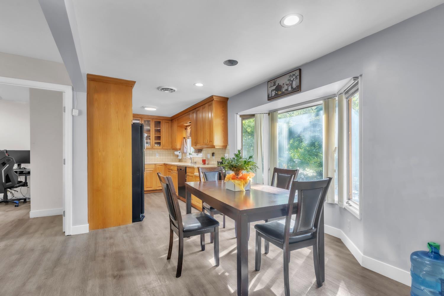 8415 Winding Way Fair Oaks, CA 95628 - Photo 2 of 27 a view of a dining room with furniture and a window