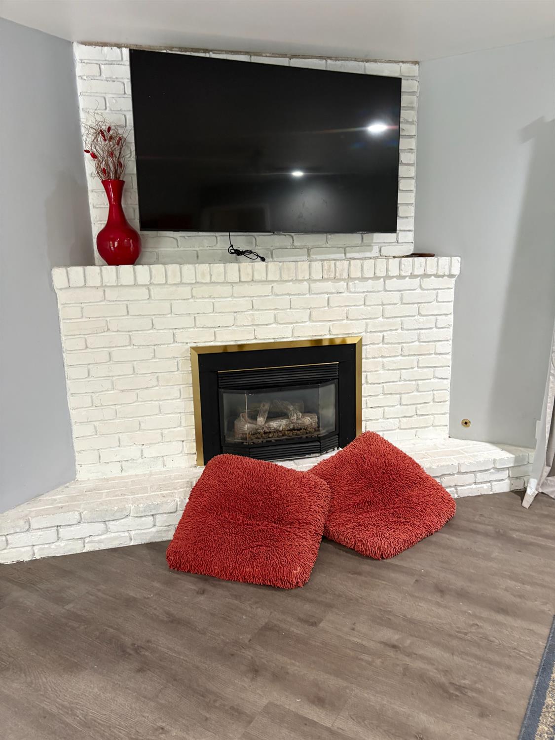 8415 Winding Way Fair Oaks, CA 95628 - Photo 4 of 27 a bedroom with a fireplace and television