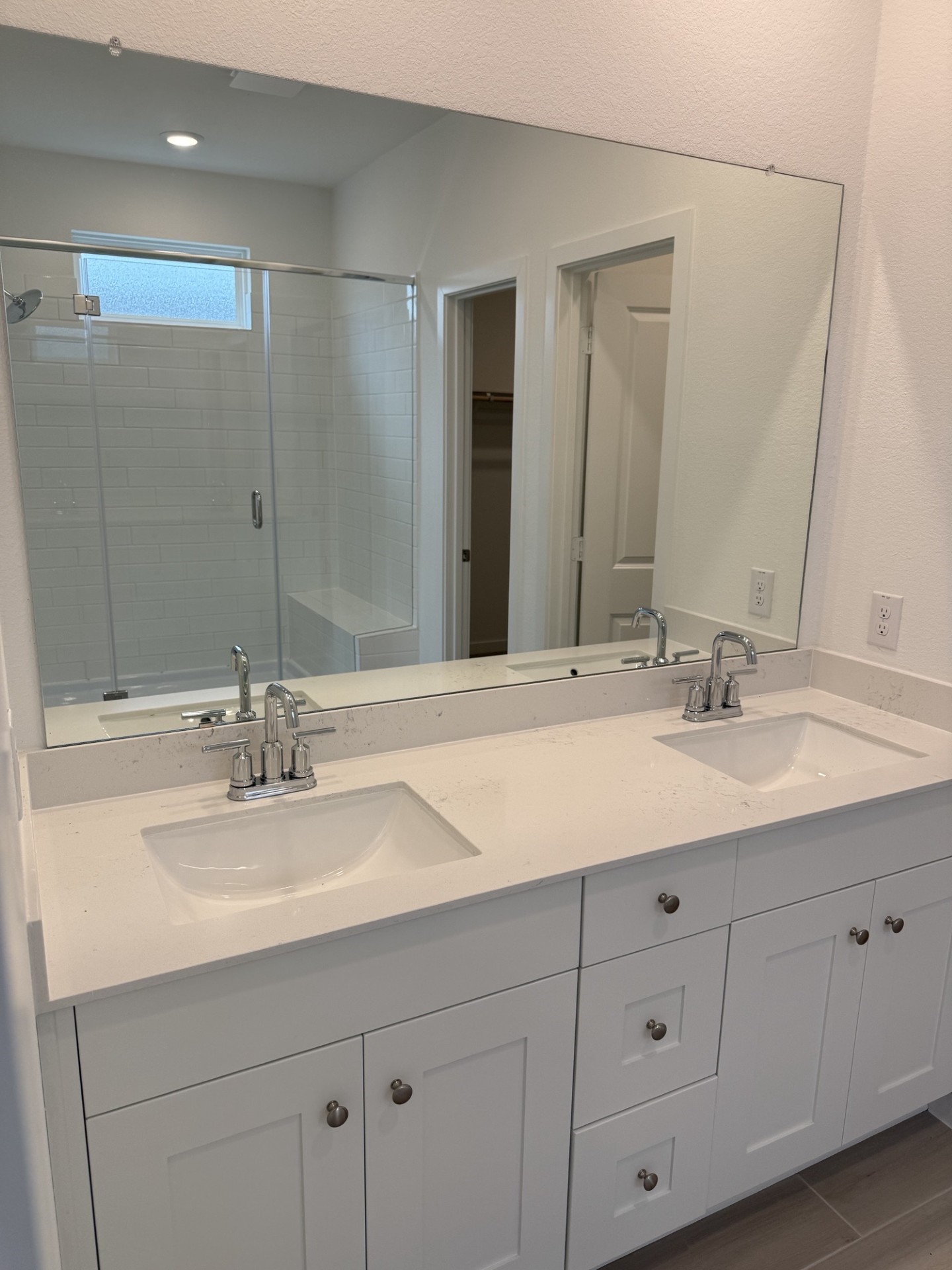 2131 Mosaic Vly Court Angleton, TX 77515 - Photo 13 of 29 a bathroom with double sink and a mirror