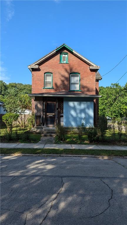 1902 Hamilton Street New Castle, PA 16101 - Photo 3 of 4 a front view of a house with a yard