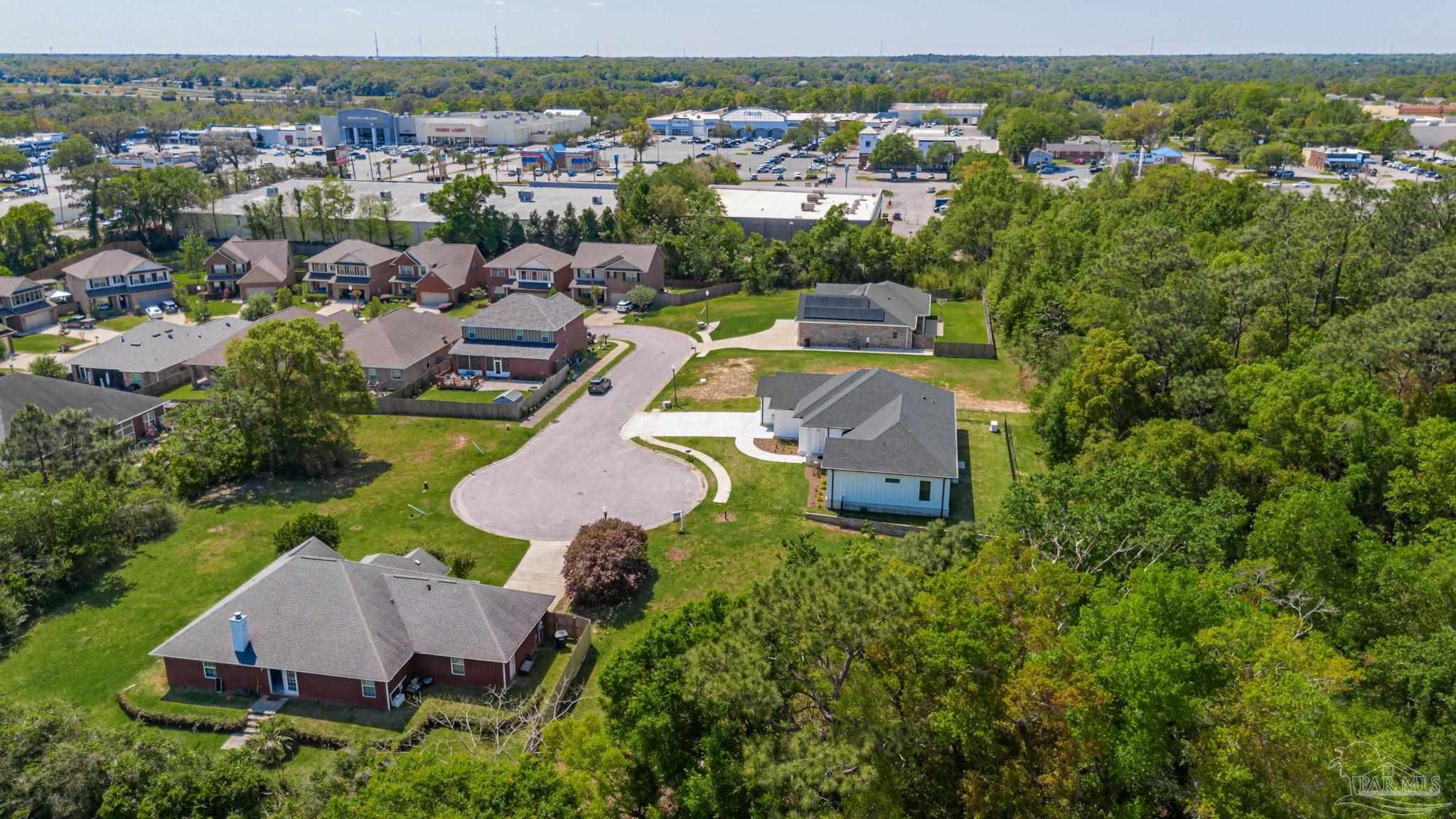675 Farmington Road Pensacola, FL 32504 - Photo 14 of 19 an aerial view of a house with a garden
