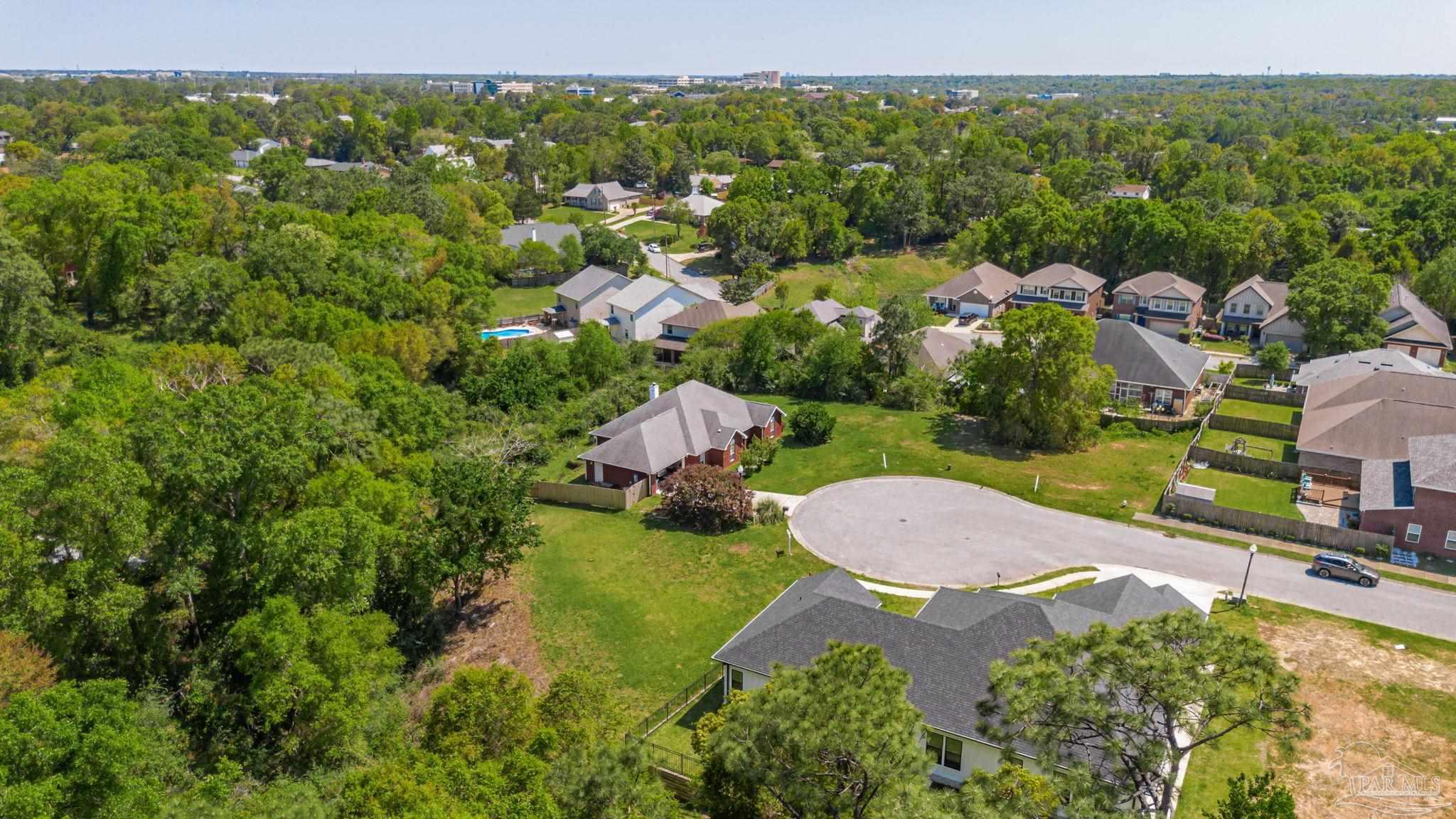 675 Farmington Road Pensacola, FL 32504 - Photo 16 of 19 an aerial view of a house with a garden