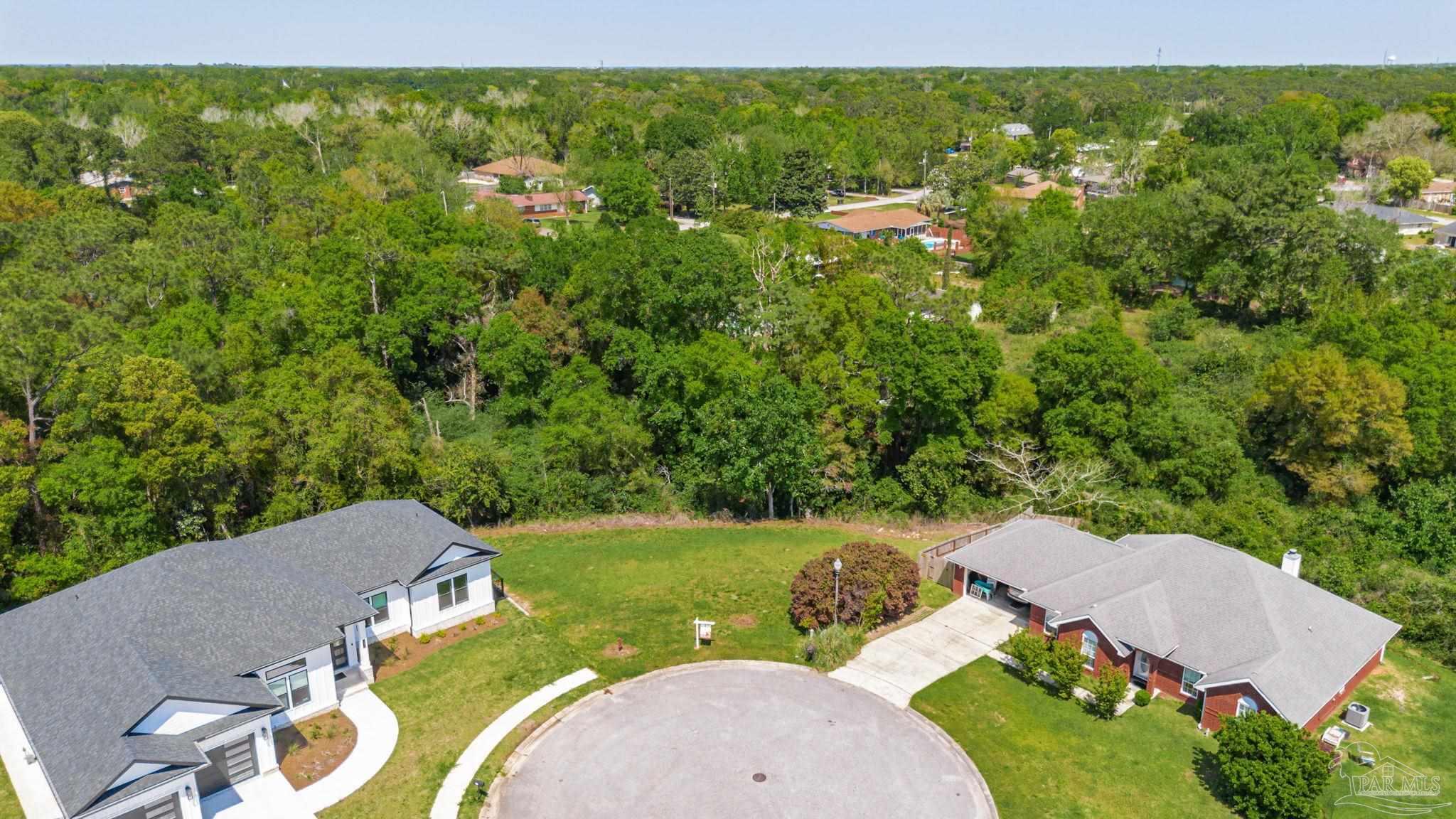 675 Farmington Road Pensacola, FL 32504 - Photo 3 of 19 an aerial view of a house having yard