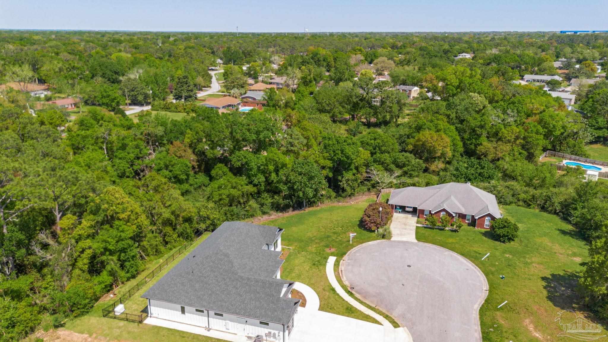 675 Farmington Road Pensacola, FL 32504 - Photo 9 of 19 a view of a golf course with a swimming pool