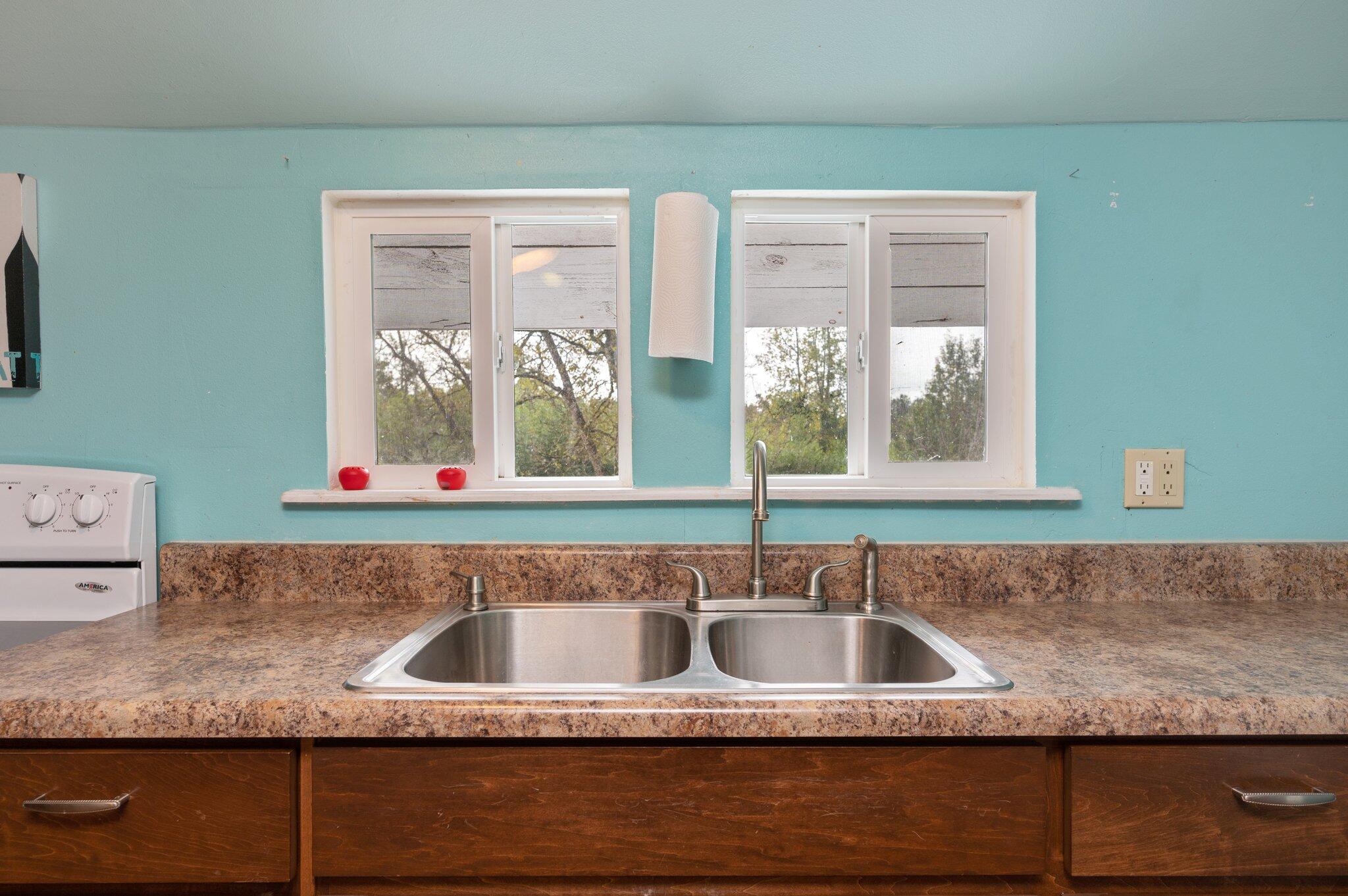 1390 Baker Manning Loop Ponce de Leon, FL 32455 - Photo 34 of 49 a kitchen with sink and window