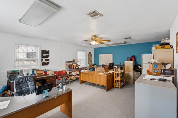 4861 E Highway Springtown, TX 76082 - Photo 11 of 29 a living room with furniture and a flat screen tv