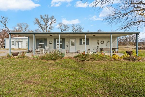 4861 E Highway Springtown, TX 76082 - Photo 12 of 29 front view of a house with a big yard