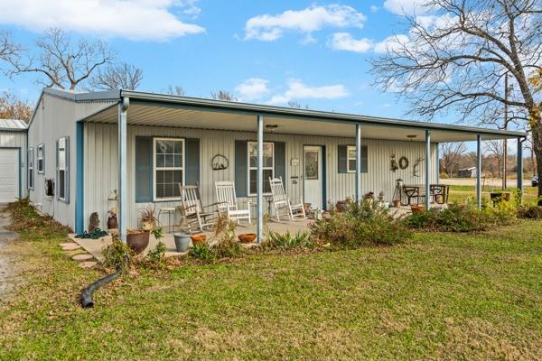 4861 E Highway Springtown, TX 76082 - Photo 13 of 29 a front view of house with patio