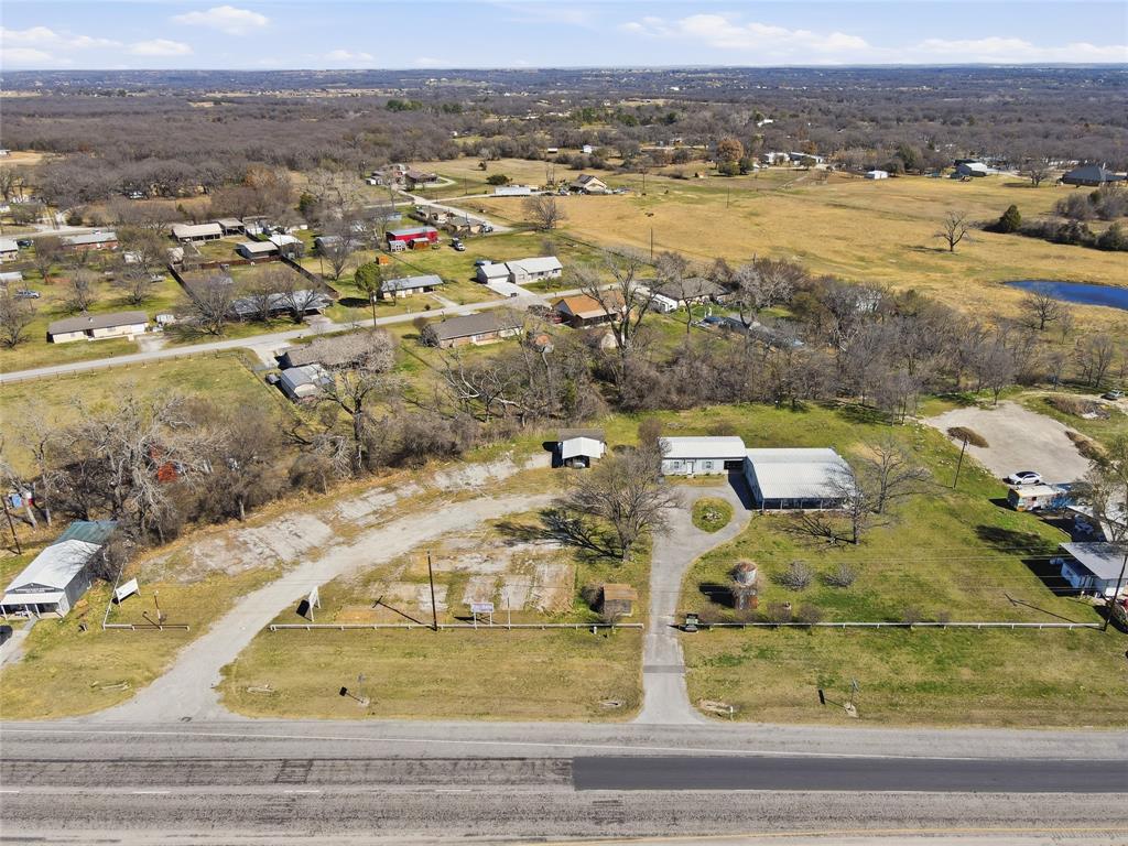 4861 E Highway Springtown, TX 76082 - Photo 2 of 29 an aerial view of residential houses with outdoor space