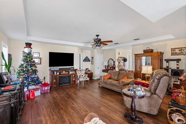 4861 E Highway Springtown, TX 76082 - Photo 22 of 29 a living room with furniture and a flat screen tv
