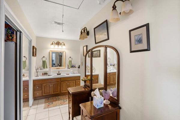 4861 E Highway Springtown, TX 76082 - Photo 26 of 29 a view of a bathroom with mirror and window