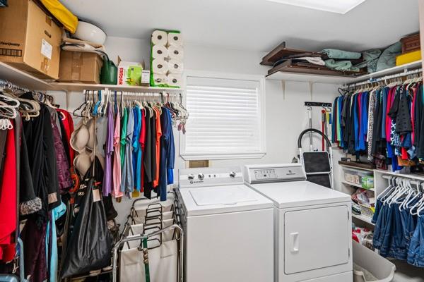 4861 E Highway Springtown, TX 76082 - Photo 27 of 29 a view of walk in closet with clothes