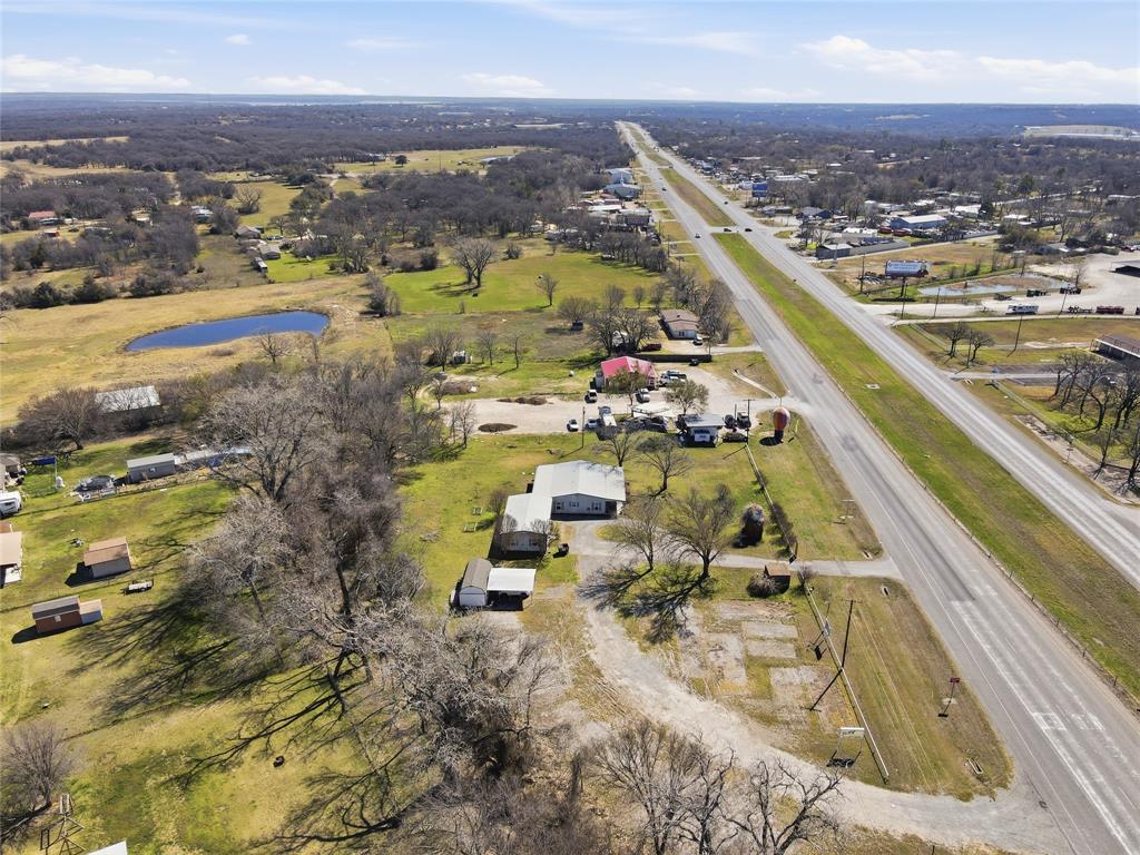 4861 E Highway Springtown, TX 76082 - Photo 5 of 29 an aerial view of residential houses with outdoor space
