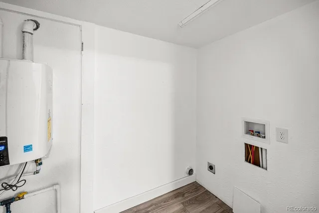 a bathroom with a shower and a sink