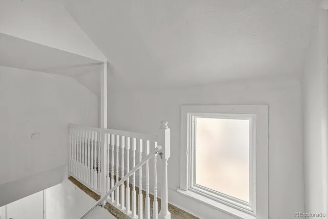 a view of a room with a window