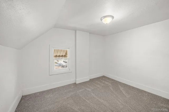 an empty room with window