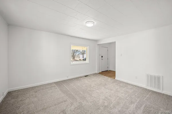 an empty room with a window