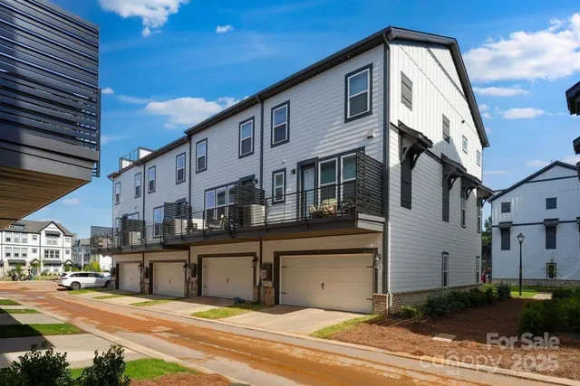 a view of a house with a street