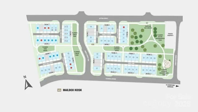 an aerial view of a house with a yard and lake view