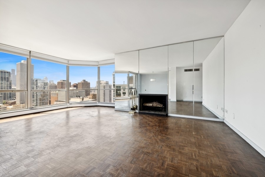1310 North Ritchie Court, Unit 27B Chicago, IL 60610 - Photo 12 of 31 a view of a kitchen with a sink and a fireplace
