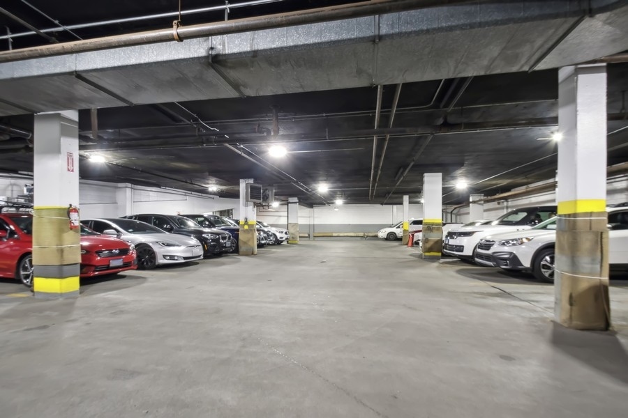 1310 North Ritchie Court, Unit 27B Chicago, IL 60610 - Photo 21 of 31 a view of parking garage with cars