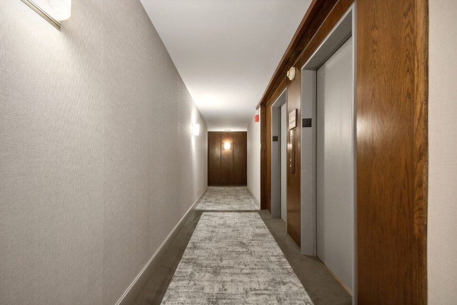 1310 North Ritchie Court, Unit 27B Chicago, IL 60610 - Photo 3 of 31 a view of hallway