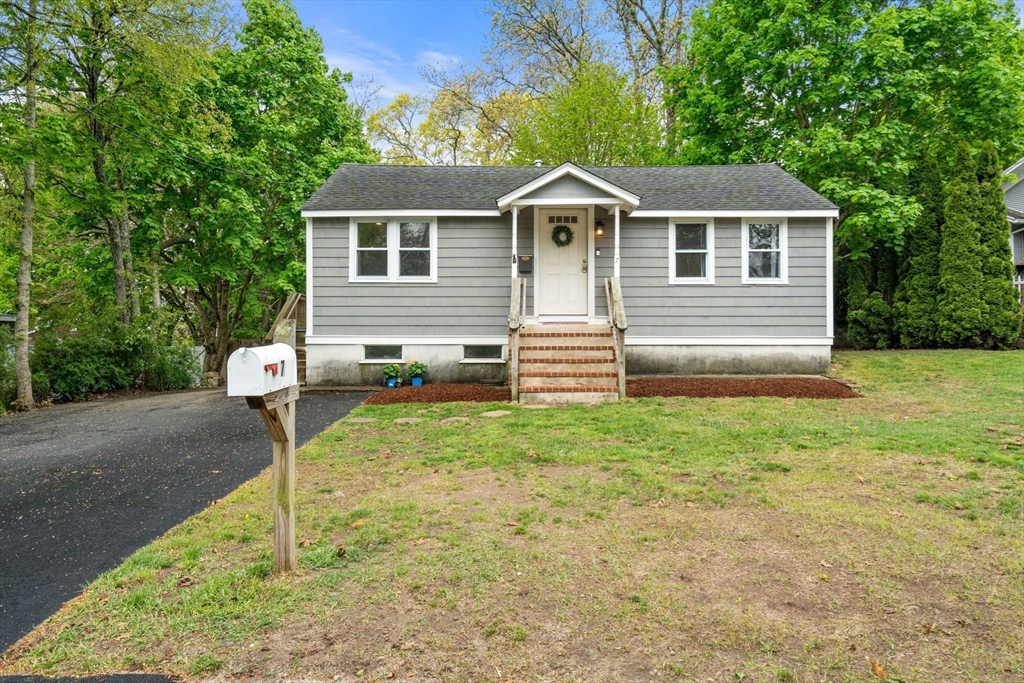 7 Indian Neck Road Wareham, MA 02571 - Photo 5 of 34 a house view with a garden space