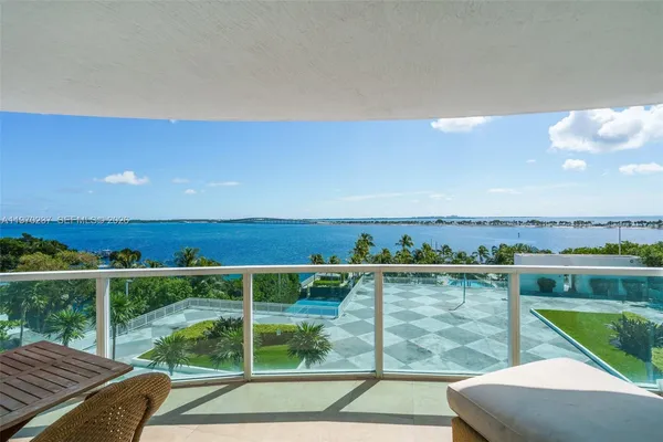 a view of a balcony with an outdoor space