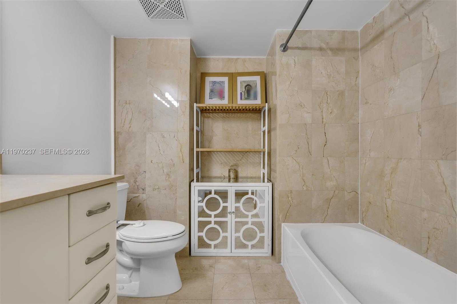 2101 Brickell Avenue, Unit 306 Miami, FL 33129 - Photo 15 of 49 a bathroom with a toilet and a shower