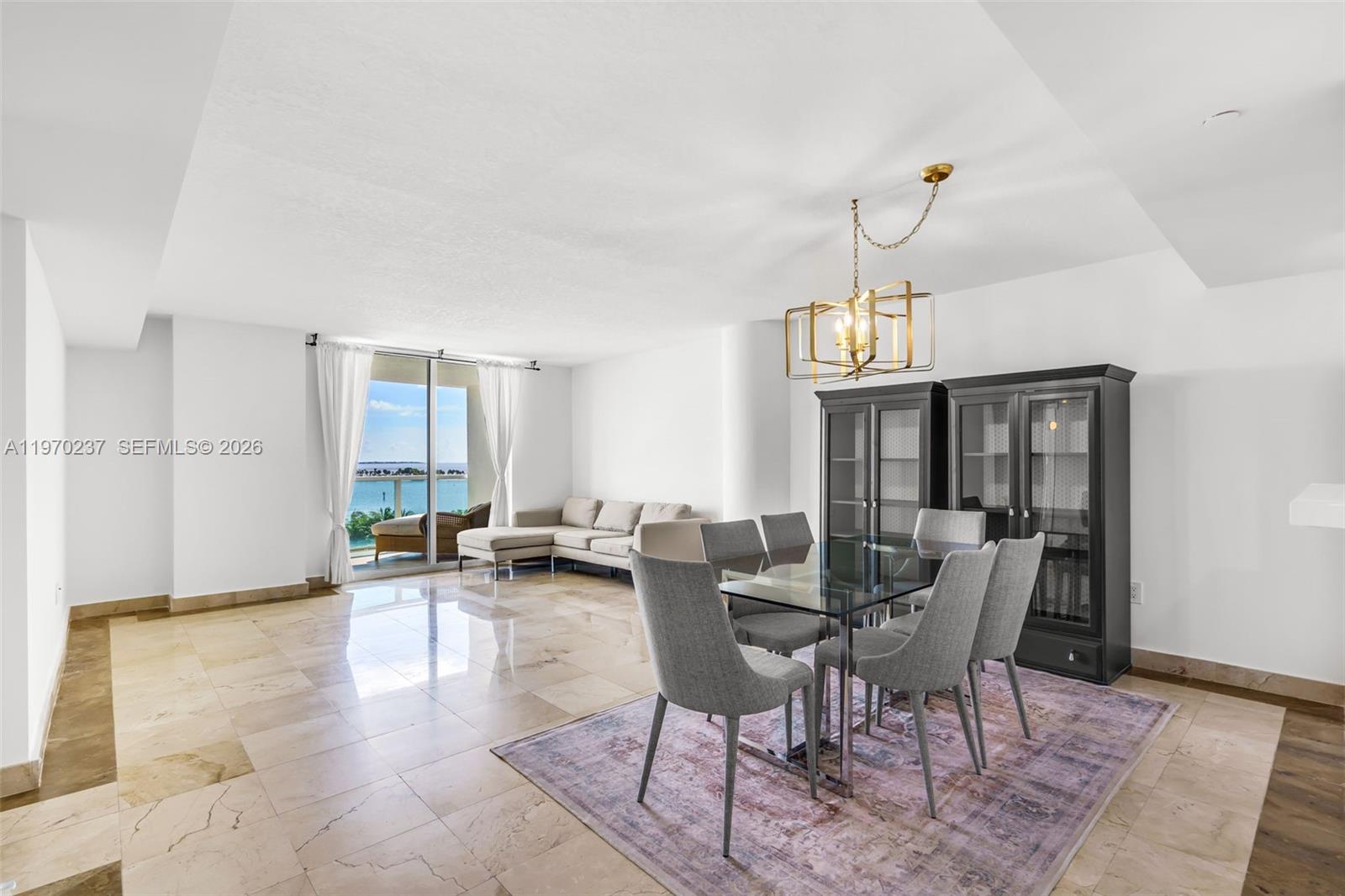 2101 Brickell Avenue, Unit 306 Miami, FL 33129 - Photo 25 of 49 a view of a livingroom with furniture and window