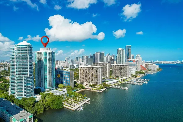 a view of a city with tall buildings