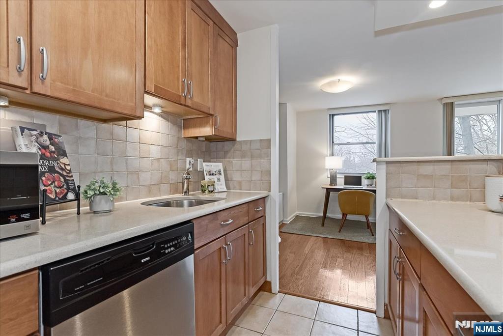 530 Valley Road, Unit C003L Montclair, NJ 07043 - Photo 14 of 25 a kitchen with a sink and cabinets