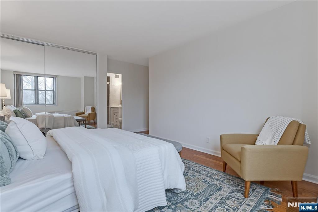 530 Valley Road, Unit C003L Montclair, NJ 07043 - Photo 16 of 25 a living room with furniture and a couch