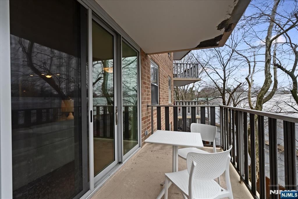 530 Valley Road, Unit C003L Montclair, NJ 07043 - Photo 21 of 25 a view of a balcony with furniture