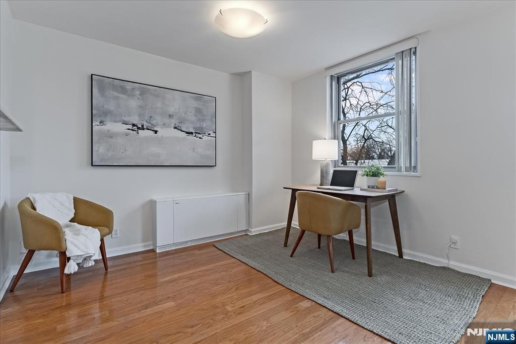 530 Valley Road, Unit C003L Montclair, NJ 07043 - Photo 7 of 25 a workspace with furniture and a window