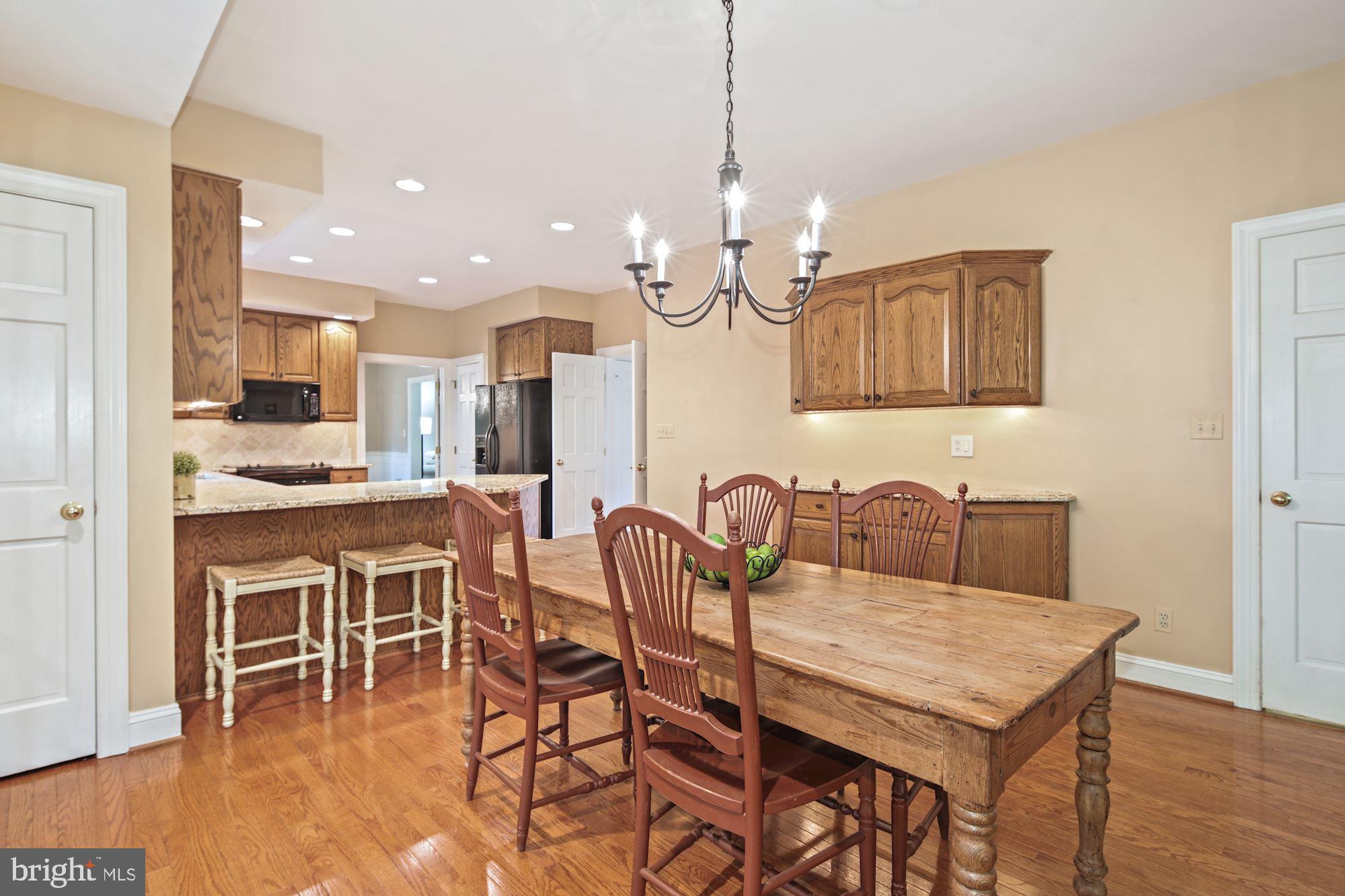 14410 Katie Road Phoenix, MD 21131 - Photo 20 of 50 Breakfast Room off Kitchen w/Door to Laundry Room